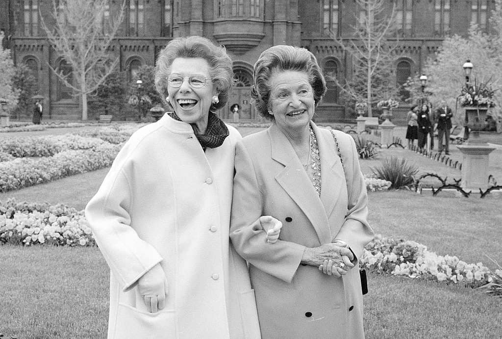 Lady Bird Johnson strolls in the Haupt Garden with its donor Enid A. Haupt