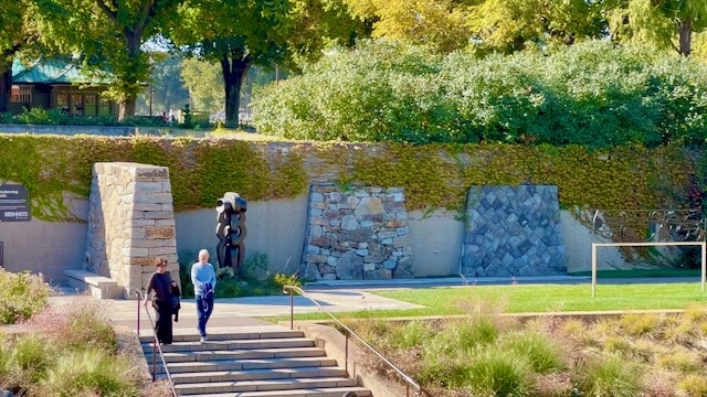 People walking into the Hirshhorn Sculpture Museum Sunken Garden, Washington D.C.